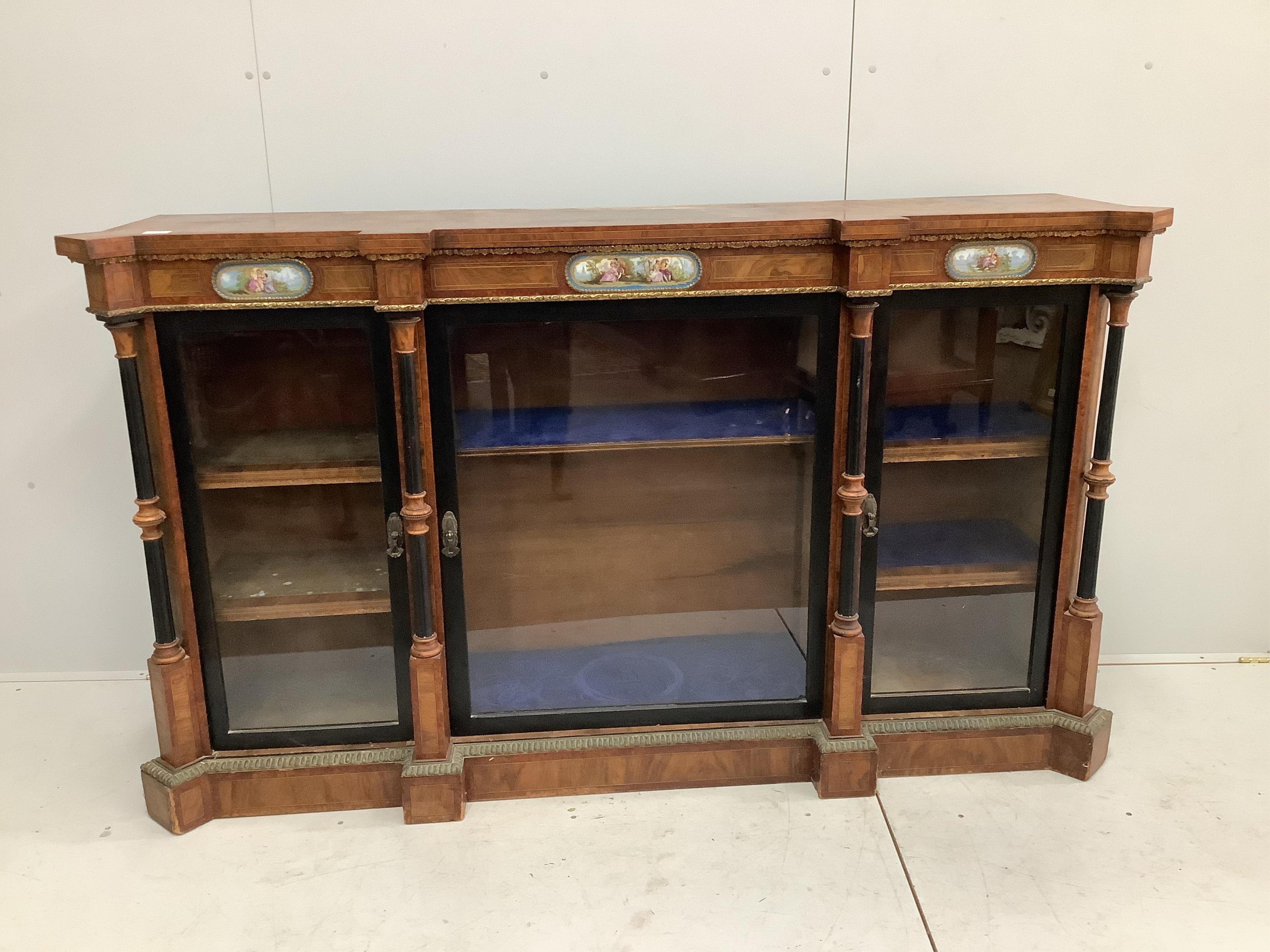 A Victorian amboyna banded figured walnut credenza, width 188cm, depth 44cm, height 109cm. Condition - fair to good